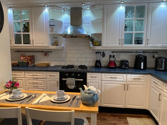 Kitchen and sitting table in a home stay hosts family home